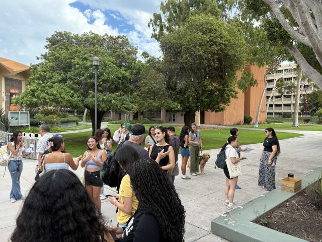 Profs. Zach Ma, Stu Feinstein, Cristie Donham, Petra Kranzfelder and Advisor Ambrocio talk to first year biology majors.