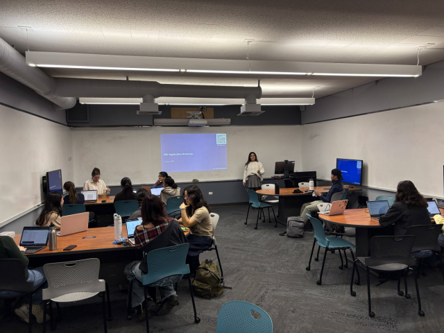 Undergraduate student Emily Kugelmann leads the workshop.